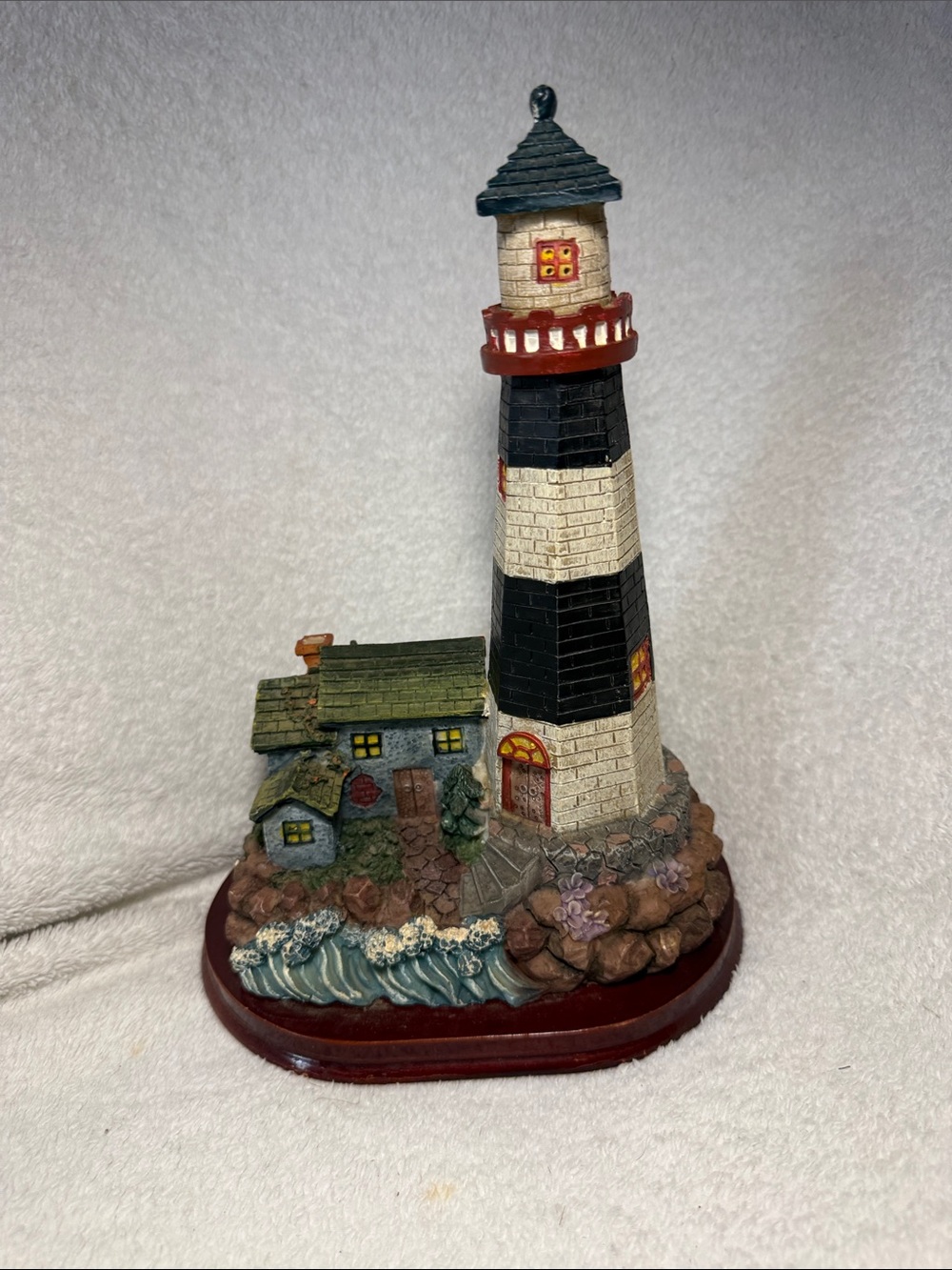 Nautica Black and White Striped Lighthouse Figurine with Coastal Cottage